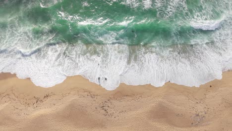 soft sunlight reflects off the water as the drone hovers above fort ord, tracing the flow of waves along the shore. filmed in real time.
