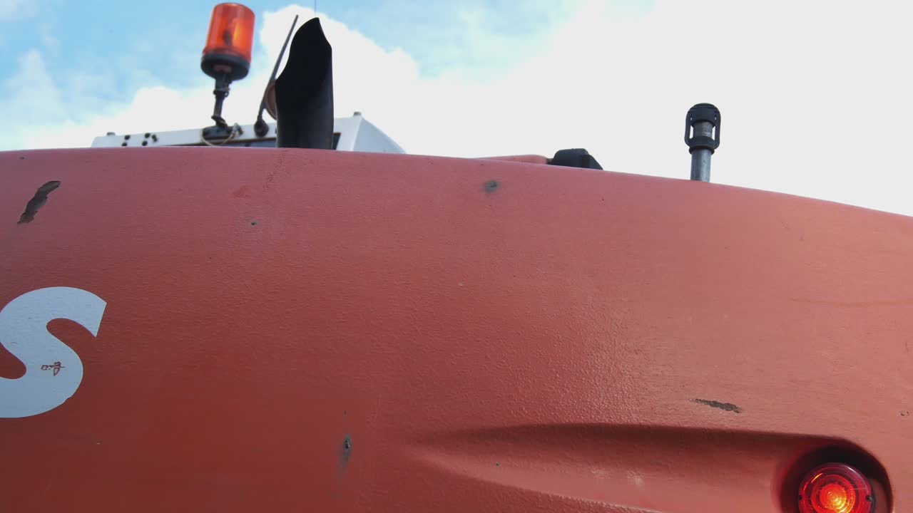 Orange Excavator Shook While Working on Construction Site