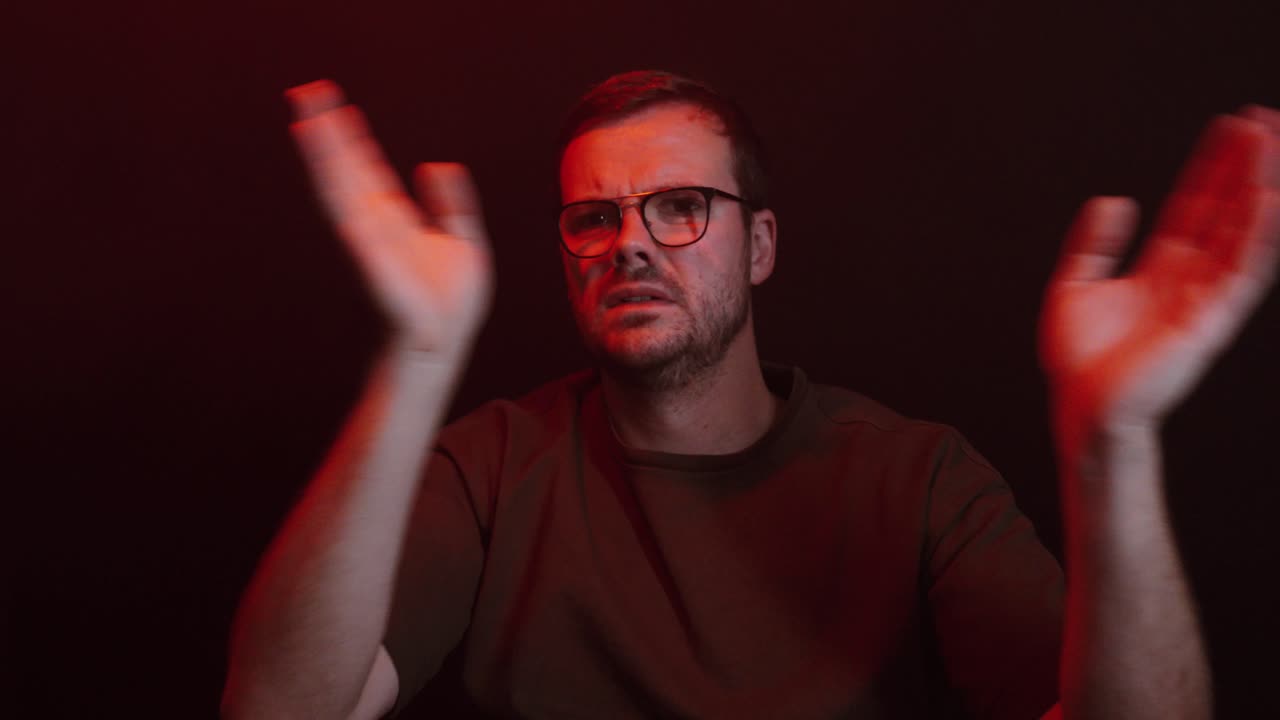A man coughs surrounded by red and gray smoke, symbolizing the harmful effects of smoking and air pollution on health and lungs. Perfect for topics on lung cancer awareness or respiratory risks
