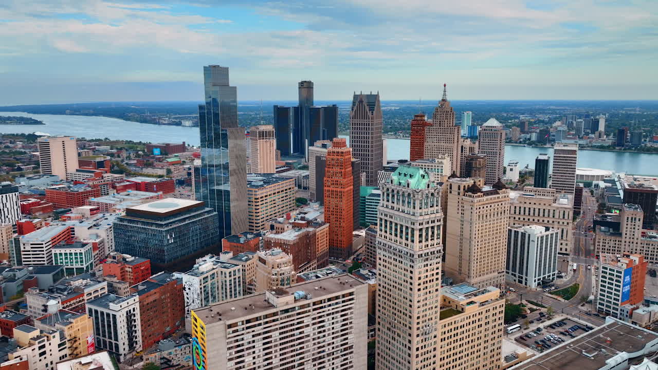 Detroit, USA, 28 July 2025: Aerial View of Detroit Core, River, and Diverse Architecture. An elevated view captures the dense downtown core