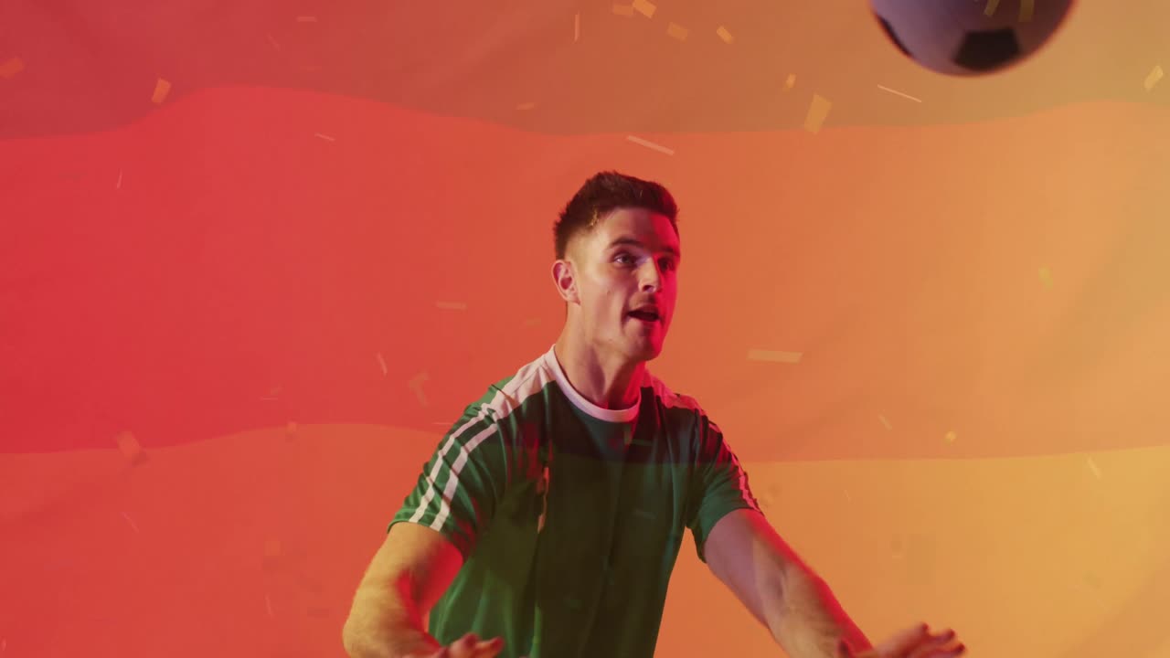 animación de confeti cayendo sobre el futbolista afroamericano sobre la bandera de alemania