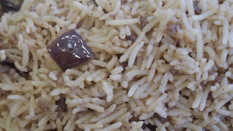 close-up of a plate of mixed rice with meat