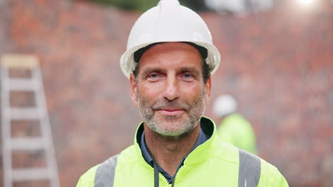 construction worker smiling on construction site
