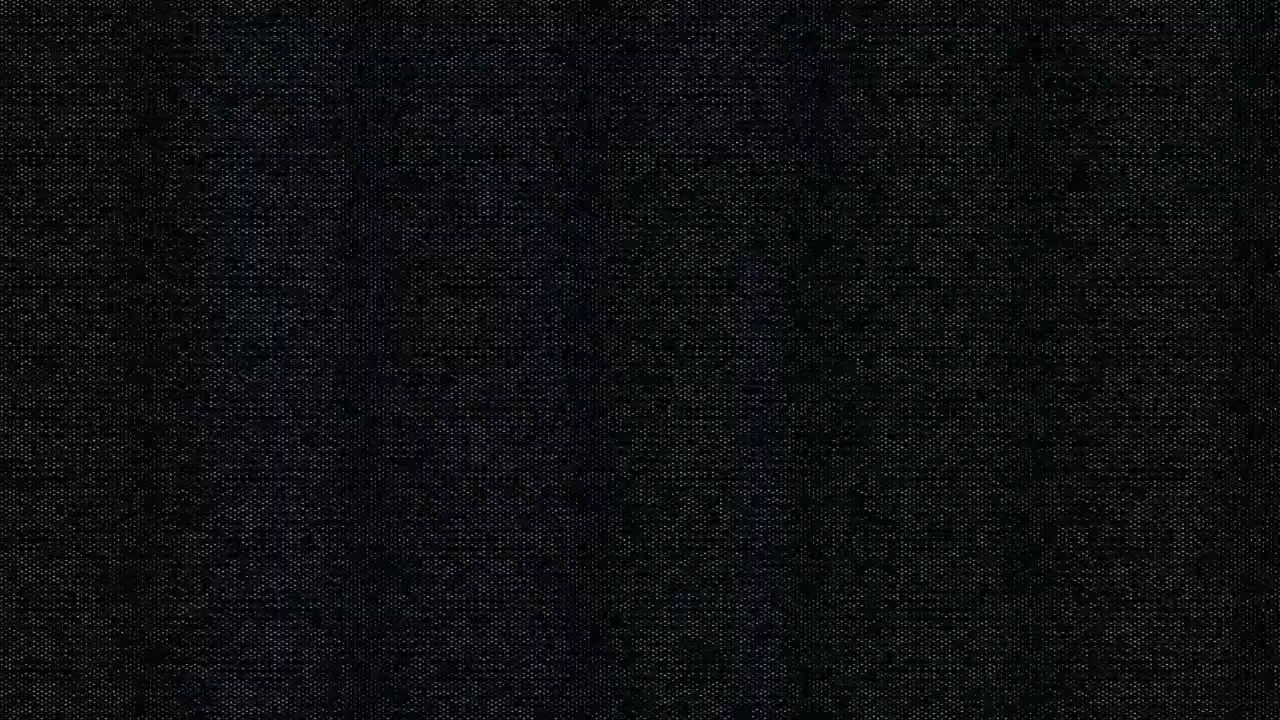 Detailní textura tmavě černé látky