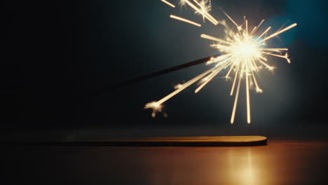 a sparkler burn in the dark room