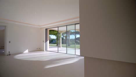 Establishing-shot-of-an-empty-living-room-with-sliding-patio-doors