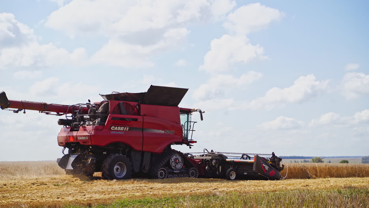 Grain harvesting combine. Harvesting machine working in the field