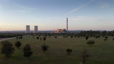 thermoelectric power plant drone shot at sunset