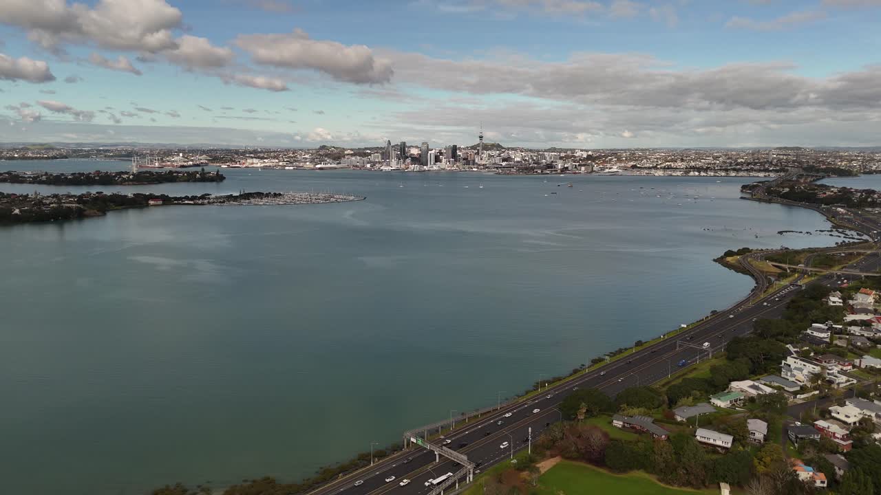 Panoramic view of Shoal Bay and the coastal road in Auckland, New Zealand