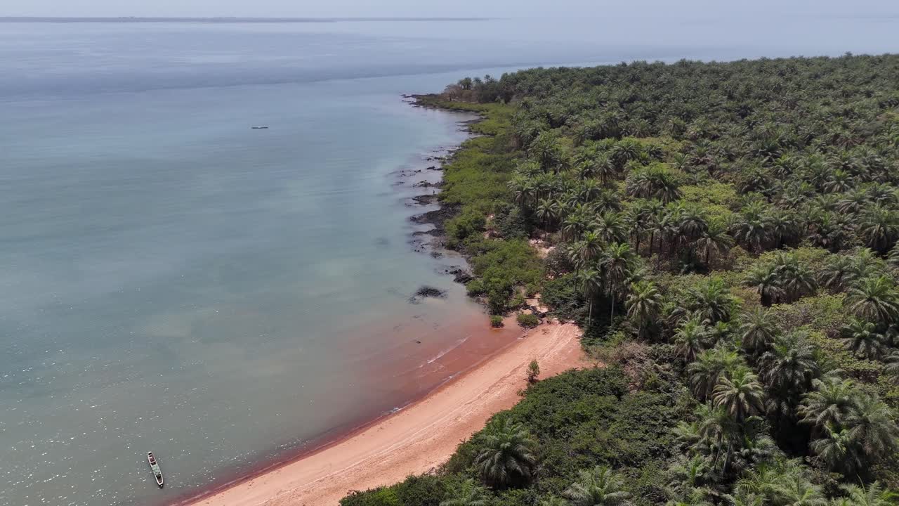 Aerial shot of remote Pink Sand Beach in West Africa, Guinea-Bissau, highlighting tropical wilderness and untouched paradise