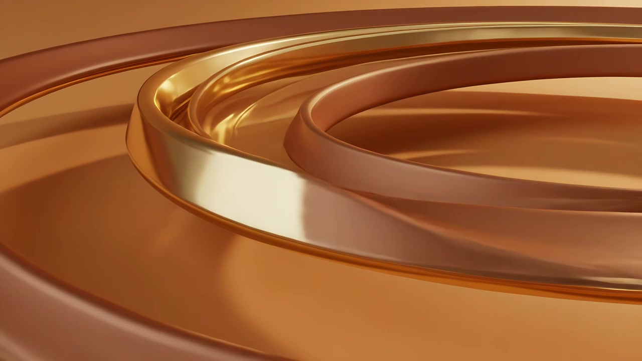 Telecamera che si allontana rivelando anelli concentrici di rame e oro su base da studio, con luce soffusa che accentua.