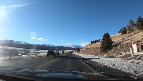 time lapse driving through old town in the colorado mountains on clear sunny winter day