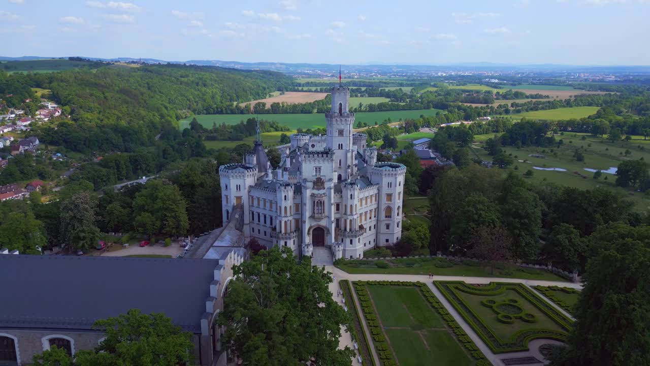 Fantastic aerial top view flight Hlubok&aacute; Nad Vltavou is a Fairy tale castle in Czech Republic Europe, summer day 2023