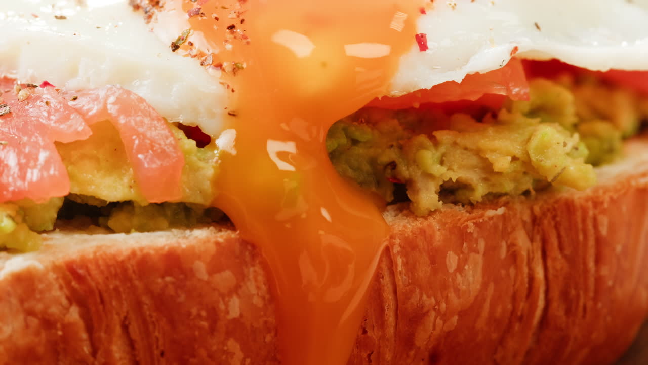 Breakfast Croissant Sandwich with Egg, Avocado, and Salmon