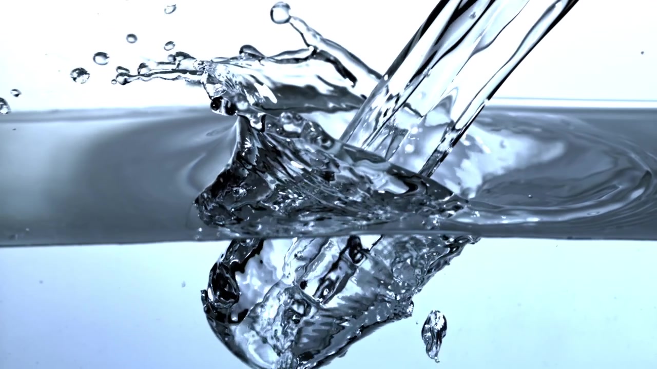 Clear Water Pouring and Splashing with Bubbles