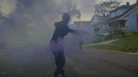 Group-of-people-dancing-and-spinning-smoke-sticks