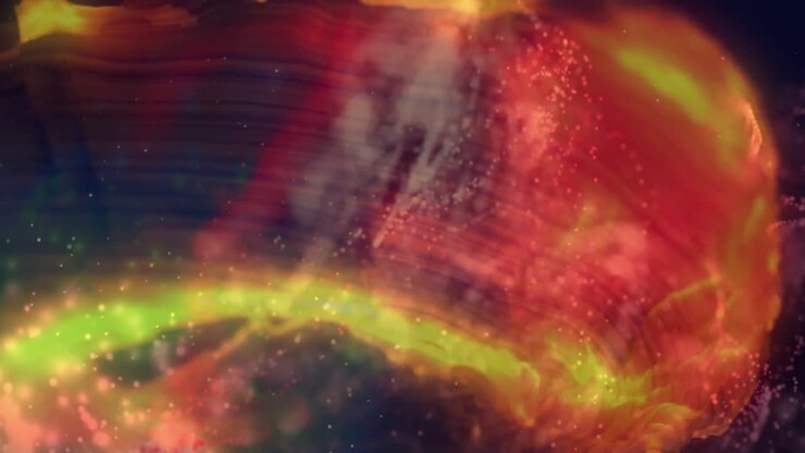 Animation of white spots over red and yellow shapes
