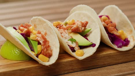 delicious chicken tacos with avocado and corn