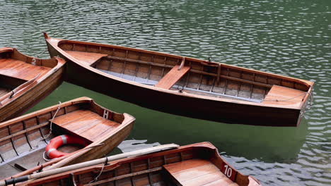 tranquil reflections: alpine wooden boats on the water