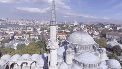 beautiful aerial around spires of mosque reveals bosphorus river and the city of istanbul turkey 1