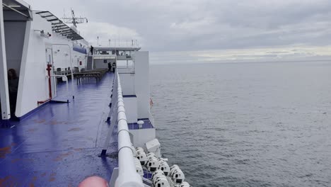 side of a ferry ship in the middle of the sea near finland