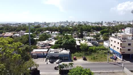 santiago, dominican republic - drone flight through the streets of santiago de los caballeros, commercial area