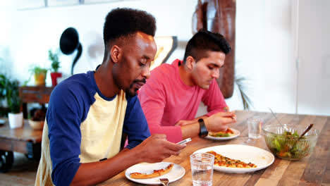 gay couple having meal together