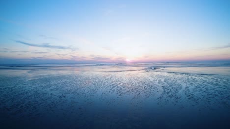 drone flight over the north sea after sunset