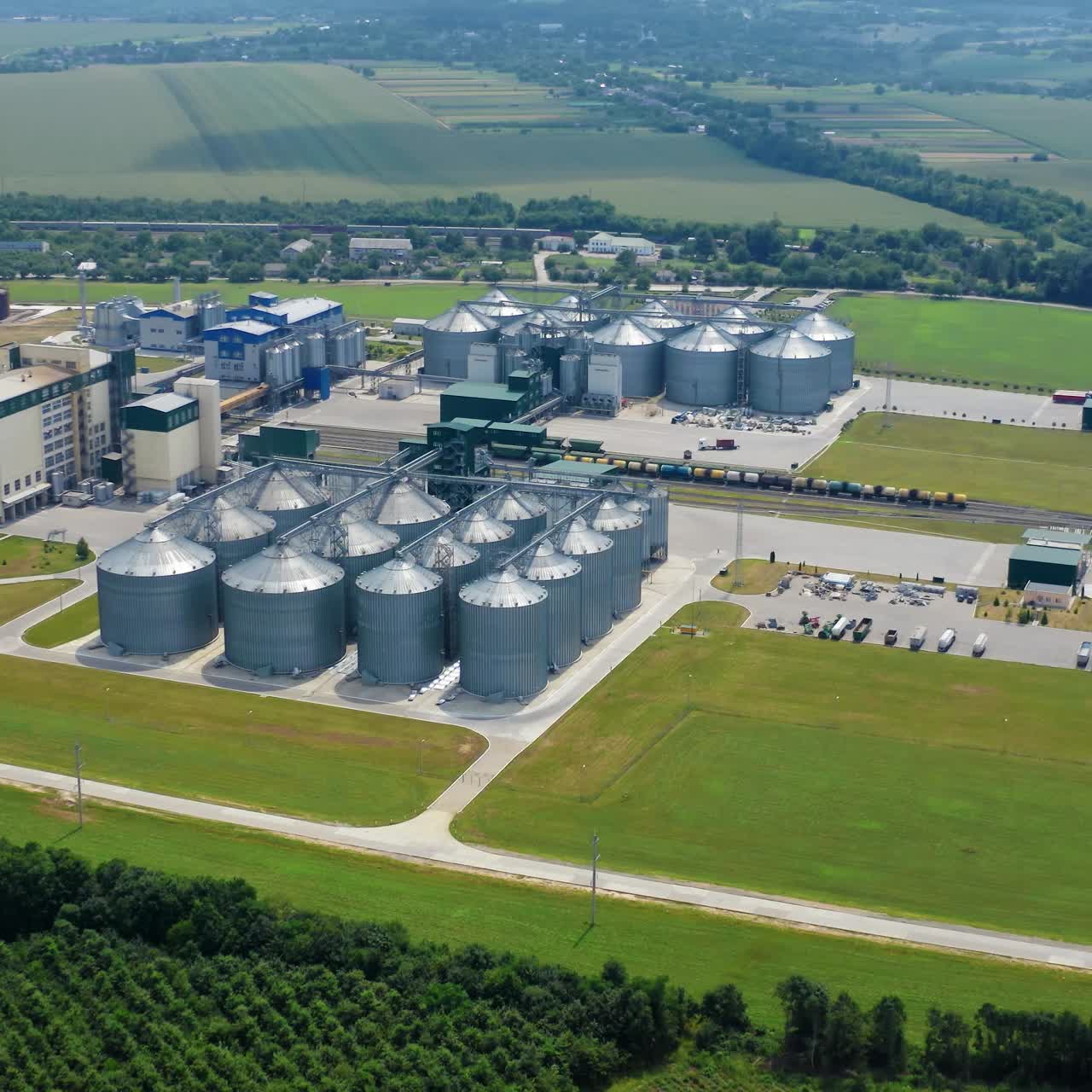 Grain storage in large silos. A large tanks for grain or seed near road
