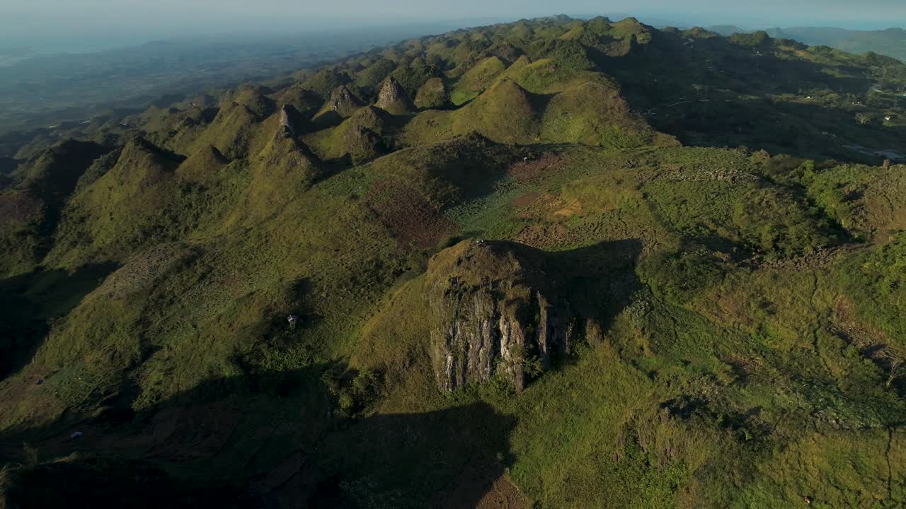 Osmena Peak in scenic landscape of Cebu, Philippines, aerial at sunset