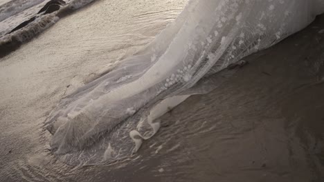 wedding dress on the beach