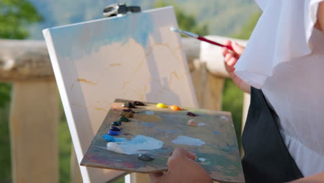 artist painting outdoors