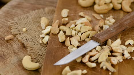 chopped cashew nuts on a rotating plate (seamless loopable)