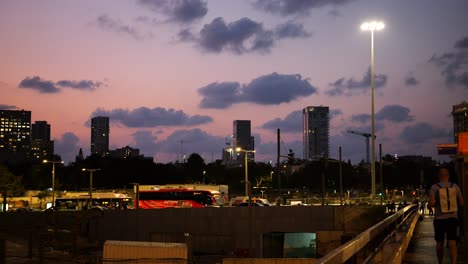 evening traffic and commuters in tel aviv, israel