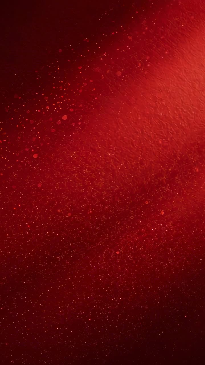 Video verticale: parete rossa che cambia da luce soffusa, primo piano, con macchie, bagliore diagonale