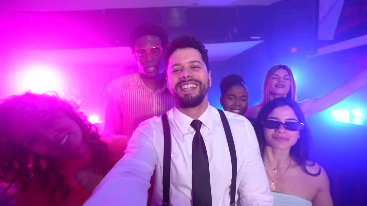 Group of friends enjoying a night out at a club