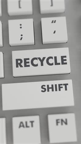 presión del botón de reciclaje en el teclado vídeo vertical