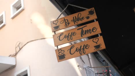 wooden coffee shop sign