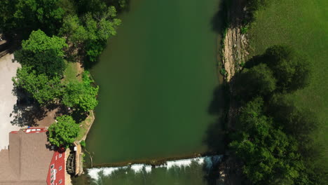 Aerial-Drone-Of-War-Eagle-Mill-Bridge-Over-River-Near-Rogers,-Arkansas-USA