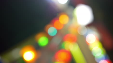 Colorful-illumination-of-attraction-at-fun-fair-defocus