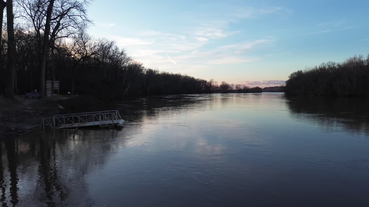 James river shoreline with trees and piers in cold winter morning