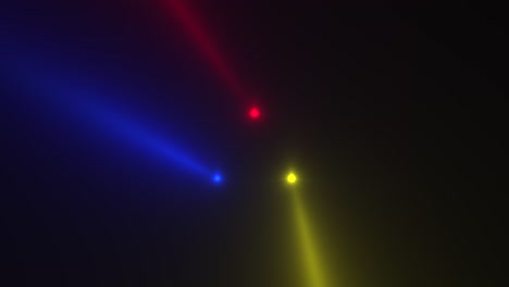 colorful glowing spotlight beams on black gradient stage