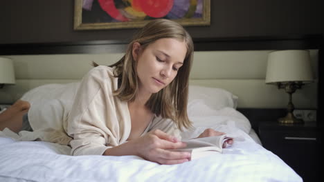 woman reading in bed