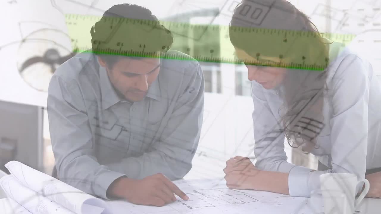 архитекторы обсуждают планы строительства