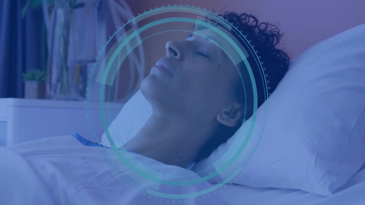 Paziente che attiva una sovrapposizione di anelli trasparenti rotanti per la scansione cerebrale in una sala per studi sul sonno