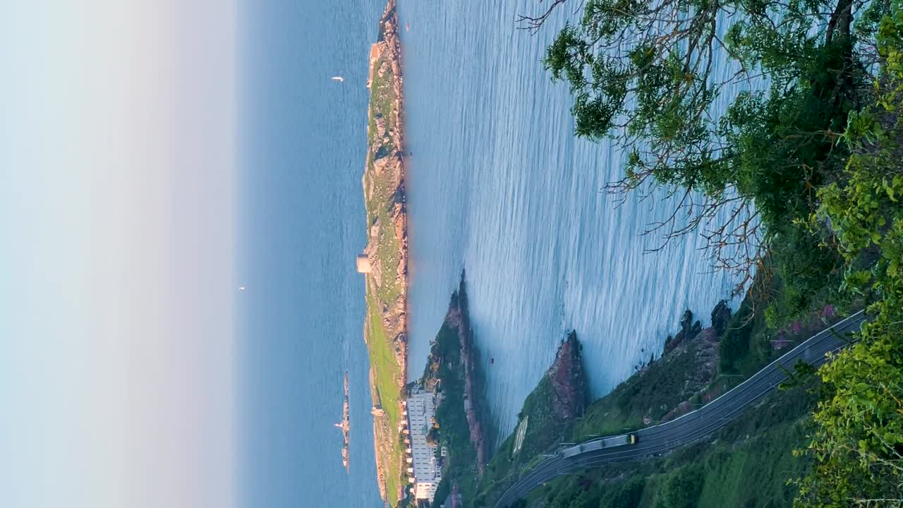 Irish Rail Journey: Vertical Video of Evening Tranquility from Killiney Hill with Dalkey Island in The Background