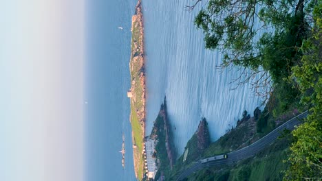irish rail journey: vertical video of evening tranquility from killiney hill with dalkey island in the background