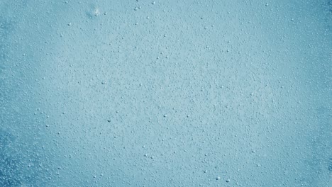 oxygen bubbles in water on a blue abstract background