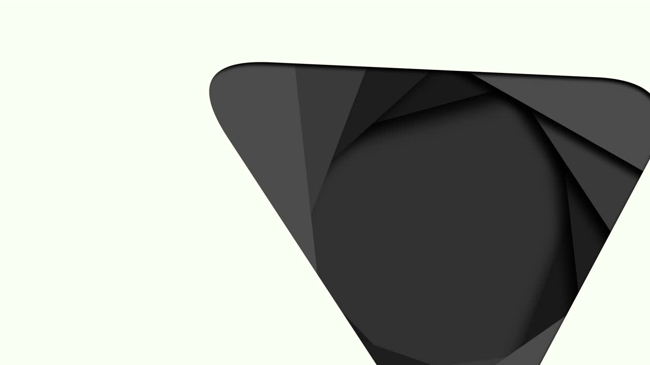 Wrinkled and folded black paper triangle