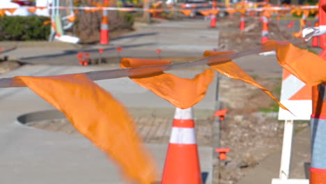 orange flags and cones covered the area the road being in construction, windy movement